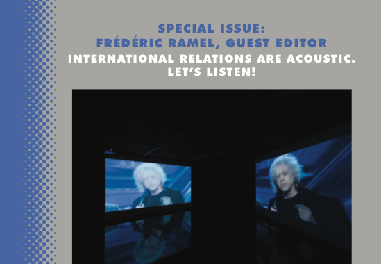 This is the cover of the AIA journal 3.2. It is a gray background, with blue stripe along the side. The center has an image that has a black background with two TV projections of a person. The projections are facing each other.